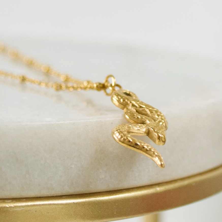 THE SERPENT PENDANT NECKLACE, GOLD